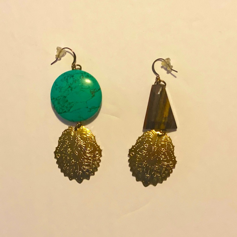 Vintage statement mismatched earrings.